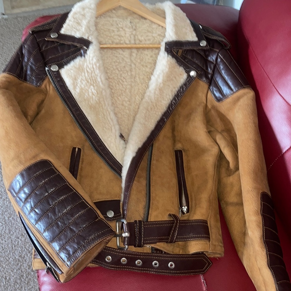 The coat is very warm NO DAMAGE I actually love it